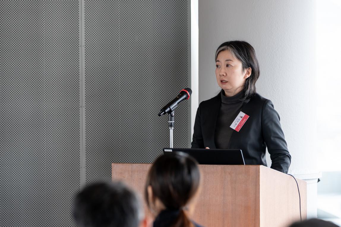 Rie Ooba giving a report at the SAF Annual Meeting