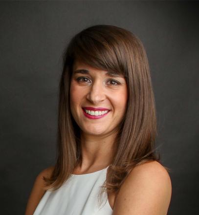 Headshot of Andrea Ferrer.