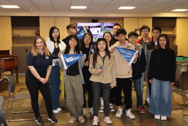Kelly O'Hanlon visits with a large group of SAF students in Santa Barbara