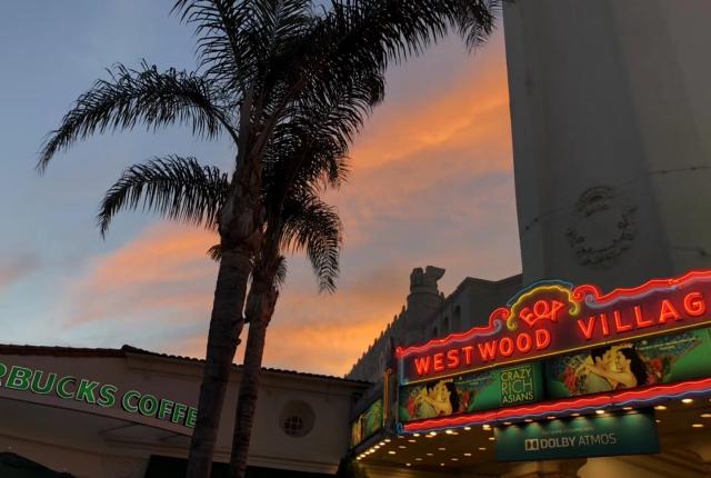 LA Westwood Village neon sign with sunset sky
