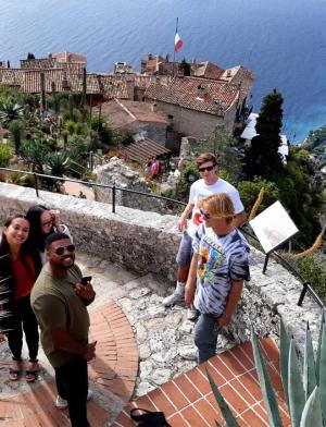 A top-down photograph of students on a balcony along the Coeur Riviera.