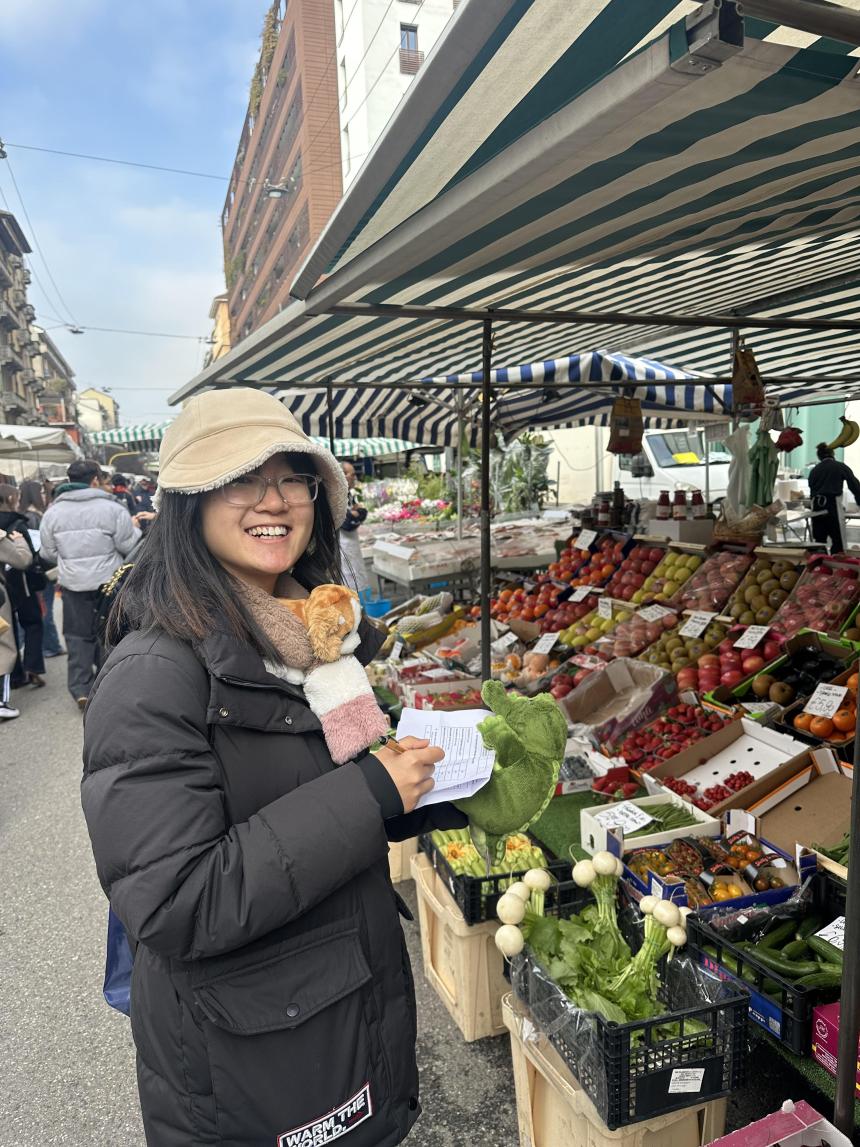 An SAF student takes part in a cultural activity at an open market in Milan